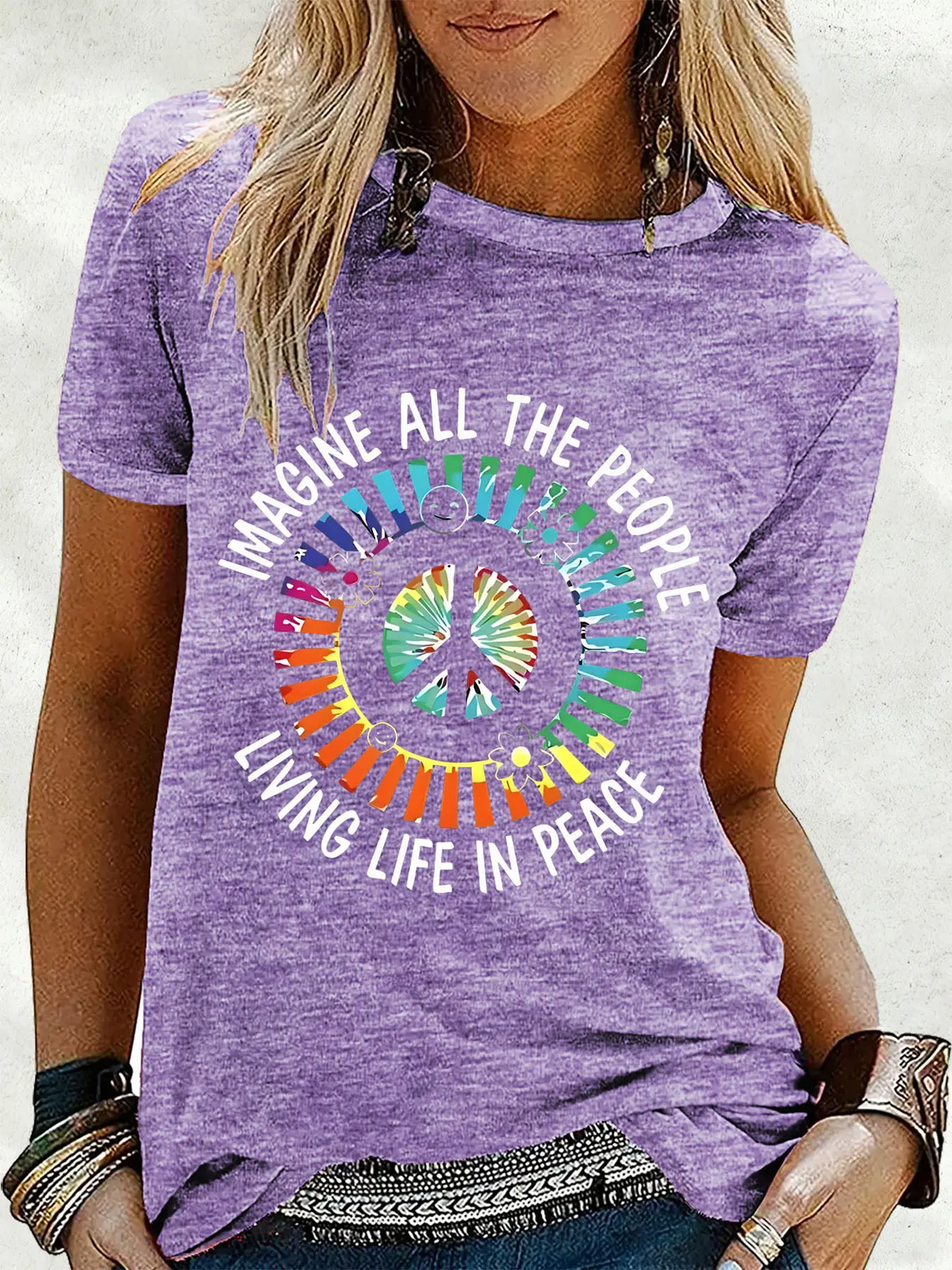 Women's short-sleeve T-shirts, Boho clothing, feature tie-dye hippie culture art prints with themes of love and peace, designed for music and rock enthusiasts, these tops come in pink, blue, green, are comfortable, suitable for vacations