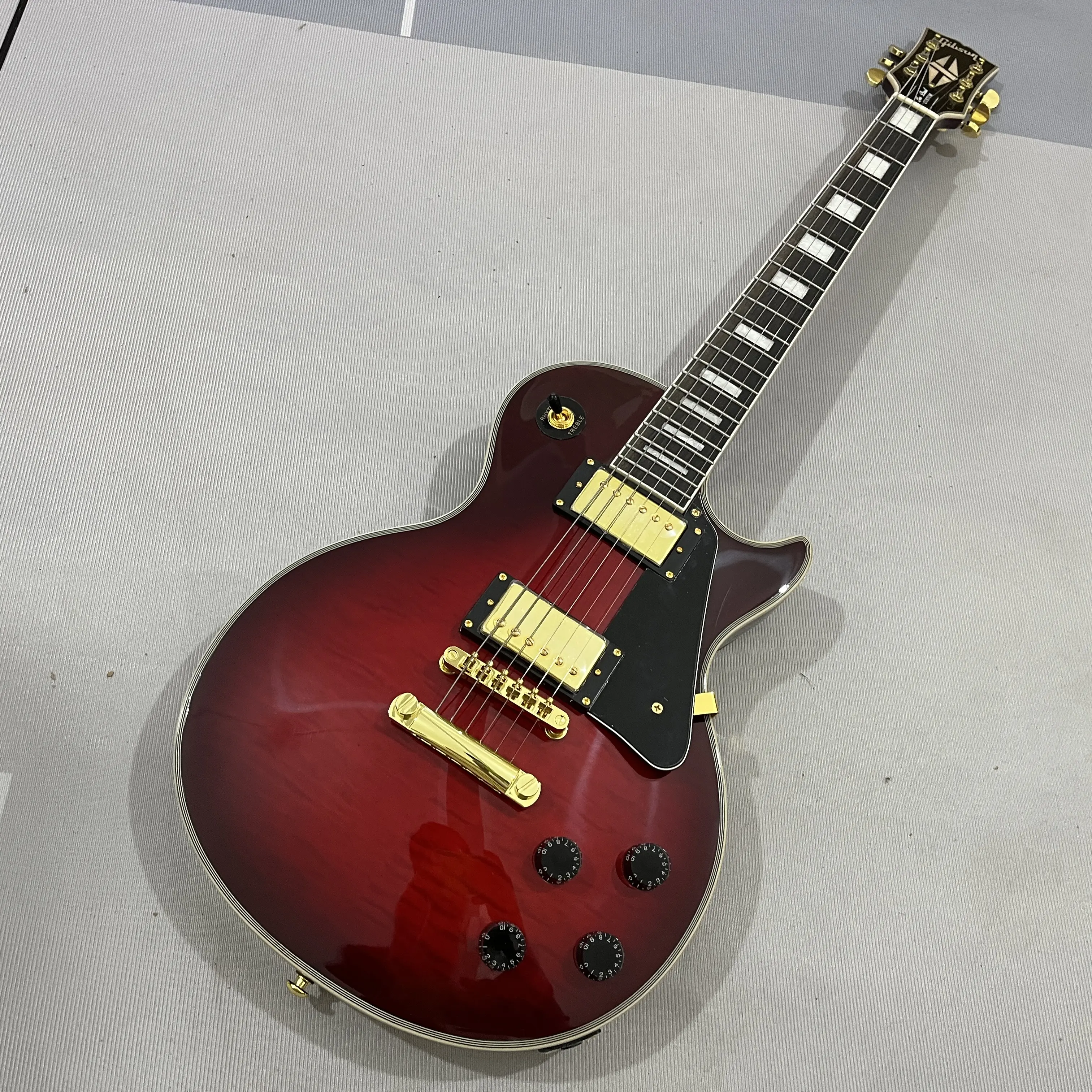 Wine Red Solid lp Guitar with flame maple veneer Gold hardware Mahogany Body