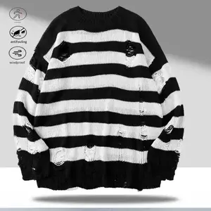 A striped holey crewneck sweater, featuring a casual versatile style, the crewneck design is practical and easy to match with other pieces. The overall design is slimming, and the classic red and black colorway adds timeless appeal. The strategic hole det
