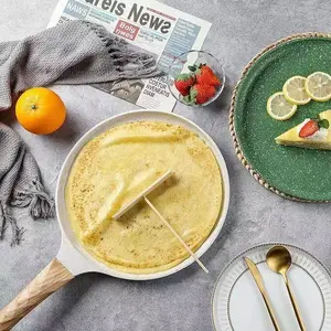 12-inch macassarite non-stick flat-bottomed pan can be used for cooking items such as steaks, pizza, and layered omelets.