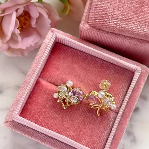 Bow heart tied studs