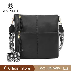 GAINSNS Stylish Women’s Crossbody Purse with Tassel Detail, Adjustable Guitar Strap & Zipper Pocket - Soft Vegan, Multi-Pocket Messenger Bag, Lightweight & Casual Design, Versatile Messenger Bag | Tassel Accent Purse | Glossy Finish Purse, Purse Crossbody