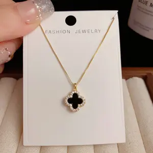 Trending Four Leaf Clover Double-Sided Pendant Necklace with Sparkling Micro Set Zirconia in Gold or Silver – Layering Collarbone Chain for Her