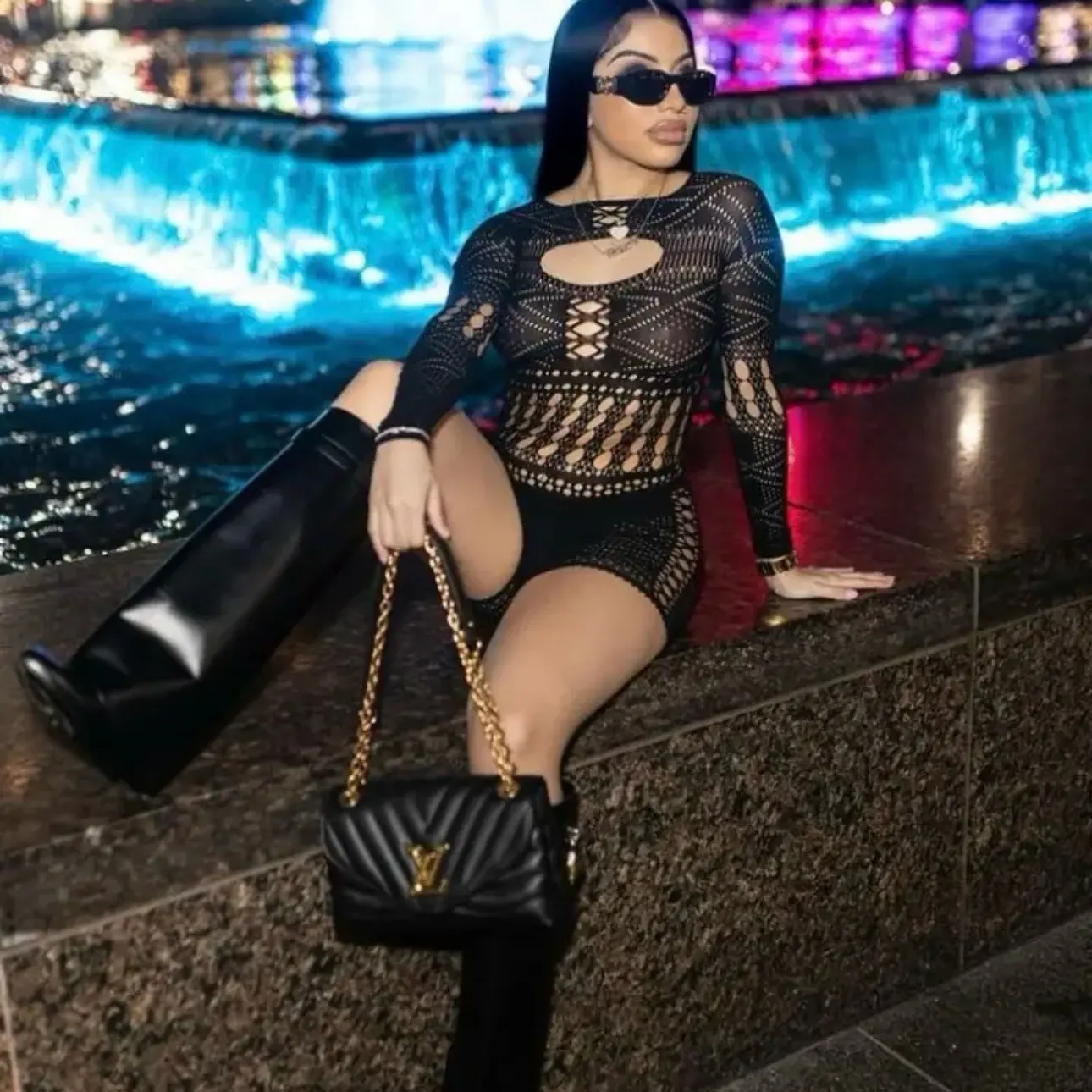 “Exclusive” bodysuit