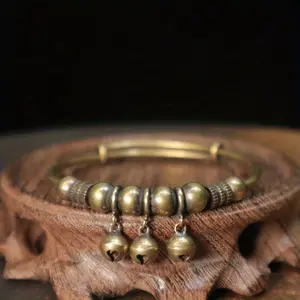 Retro Geometric Bell Money Bracelet, Push-Pull Adjustable Fashion Costume Jewelry Accessory for Stress Relief This is a piece of accessory designed to soothe the soul and relieve stress.