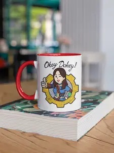 Fallout TV Show Lucy "Okey Dokey!" Mug |Two-Tone Accent Ceramic Coffee Cup | Retro Vault Dweller Graphic Gamer Merch - Gift for Fans