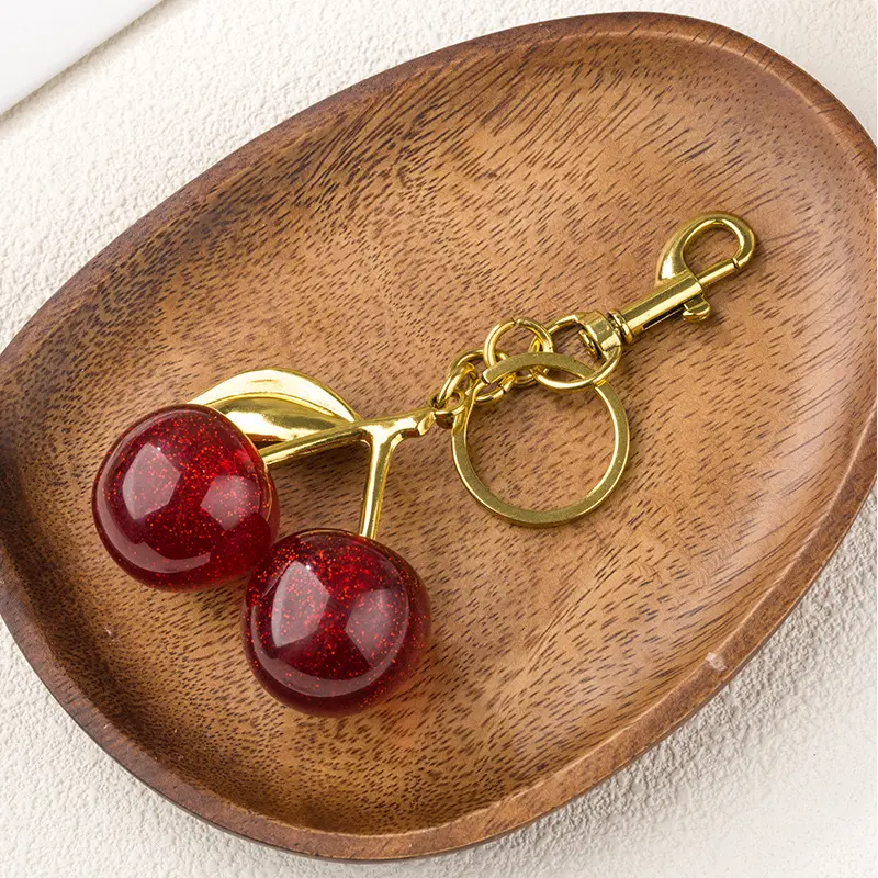 Big red cherry with golden leaves