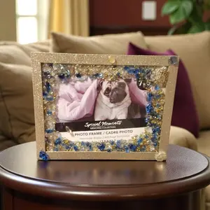 Entrepreneur Artist of 3D elegant unique abstract artwork paintings, 5x7 hand-designed photo frame crystallized for original creativity. Beautiful craftsmanship, stunning colors of blue, and white with a touch of gold. The frame is glitter gold.