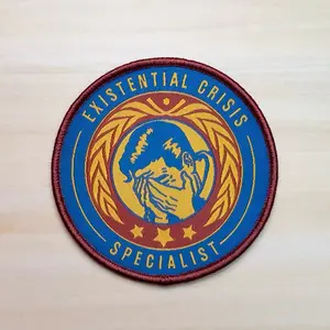 Existential Crisis Specialist Merit Badge Embroidered Woven Iron-On Patch 3 in Diameter Bold Red Blue Yellow Embroidery Classic Merrowed Border