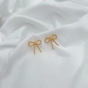 bella bow earrings
