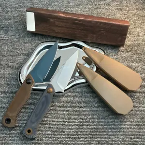 The 203 EDC fixed-blade knife features a compact design and a textured, non-slip handle, combining a stylish aesthetic with practical outdoor functionality.
