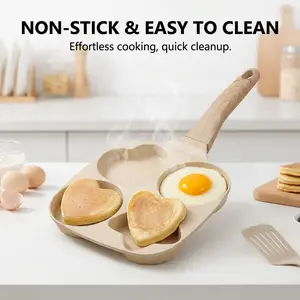 Four-hole omelet pan, nonstick with handle, breakfast pan ideal for eggs and pancakes, convenient household skillet, compatible with gas stoves and induction cooktops.