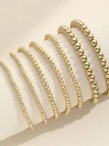 A 7-piece set of gold elastic Stackable Bracelets, with a retro style suitable for daily wear, vacation dates, and other occasions. It is also a surprising and exquisite small gift