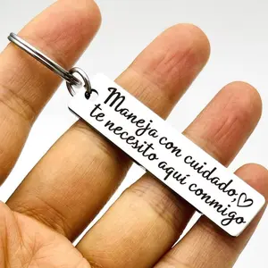 A Spanish-style keychain with a heart-shaped pattern - featuring the words "Safe Driving", on the keychain Safe Drive Keychain