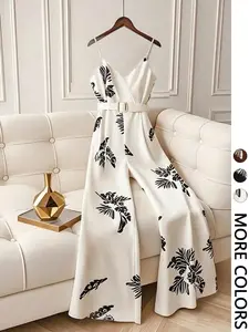 This Tropical Print Jumpsuit is Vacation Ready Casual Strap Wide Leg with Belt