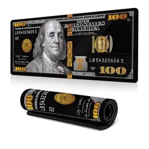 A large electronic sports game mouse pad with dollar symbol text financial theme creative art design, anti slip washable rubber base, oversized office desk pad accessories, and computer decoration anti fouling game mouse pad. The ideal gift for gamers