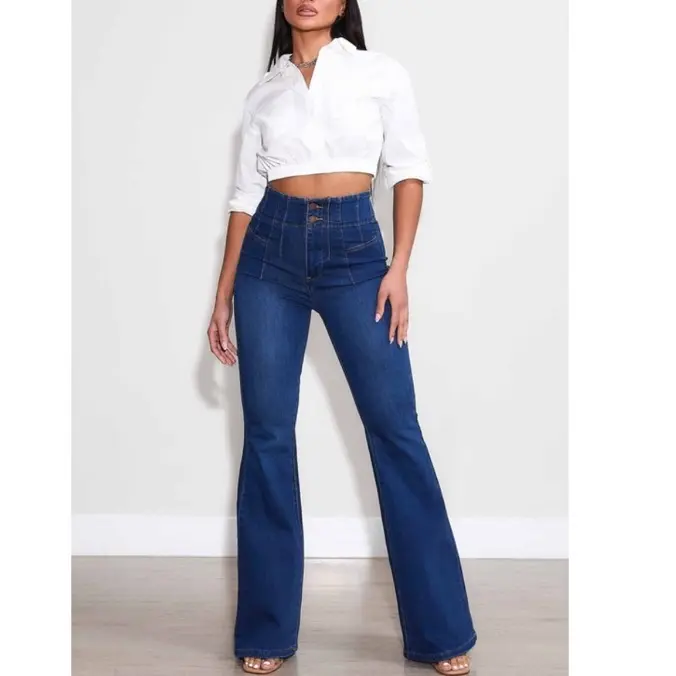 Ines Jeans - High-rise, flare jeans featuring multi-tacked waist design with two buttons, two back pockets, and a zip-fly closure. (3) Rise: 11.5", Inseam: 32" 73% Cotton 14% Rayon 11%