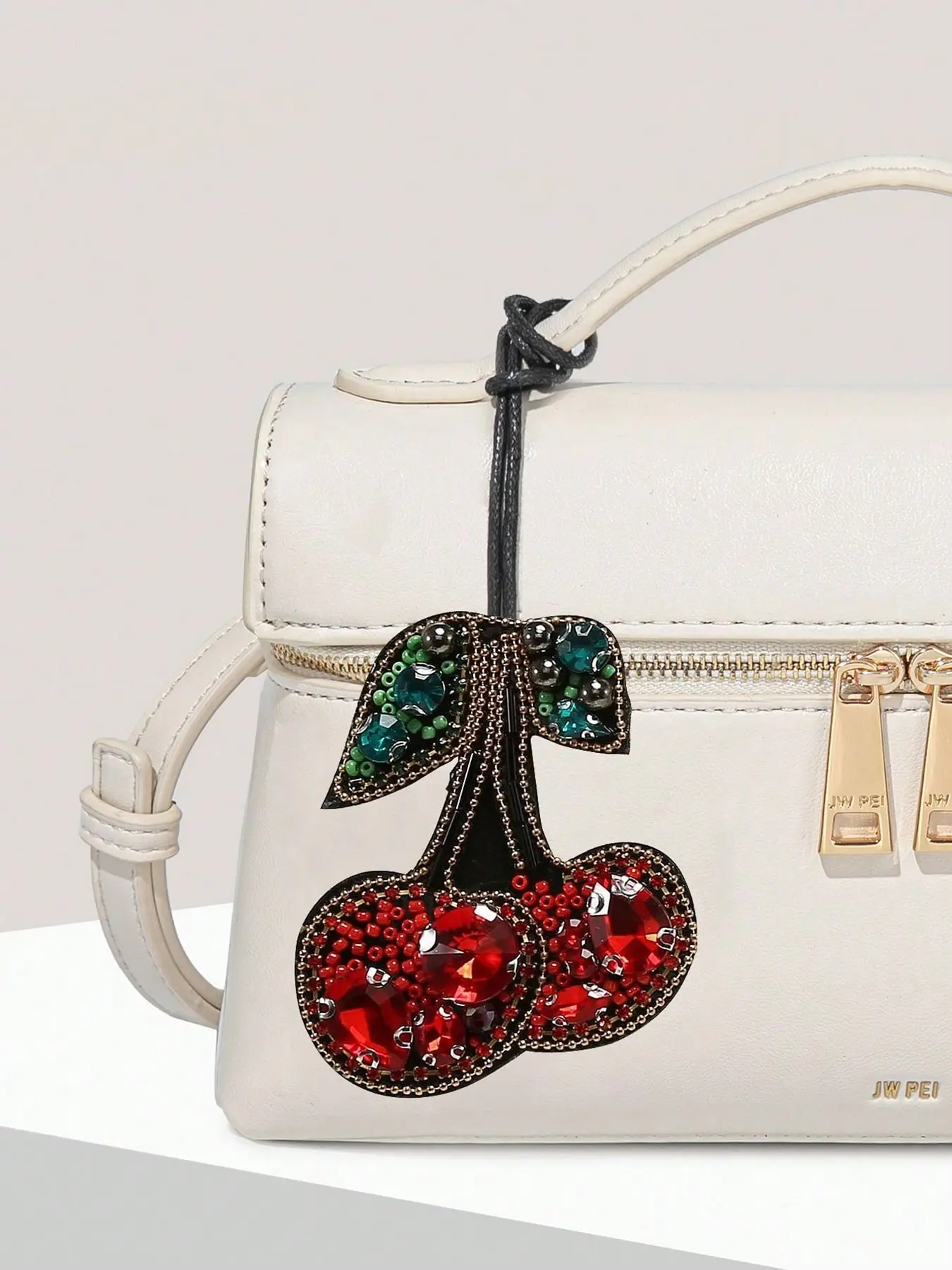 Classic style versatile red cherry pattern design for women's Valentine's Day luggage accessories, simple and trendy niche elegant women's keychain pendant, suitable for daily accessories to give to friends on Valentine's Day.