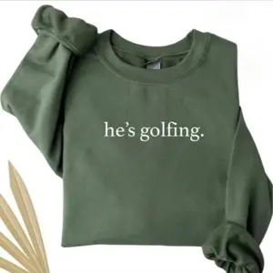 UrbanHalo - He's Golfing Sweatshirt, Golfing Season Sweater, Golfer Wife Crewneck Shirt, Golfing Mom Outfit, Golf Player for Mom, Golf Lover Pullover Gift