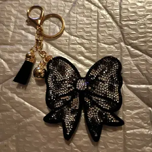 Elegant Black Rhinestone Bow Keychain with Gold Tassel and Bell Accessory