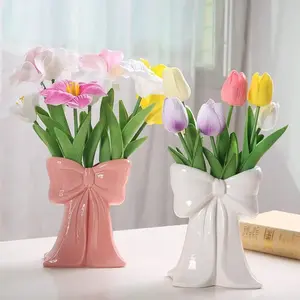 Bow-shaped tabletop vase decoration, bow ornament for living room TV cabinet, cosmetics storage box, beauty supplies storage box, makeup brush and office supplies storage box, makeup brush holder, an ideal gift for girls and women sports event souvenir ti