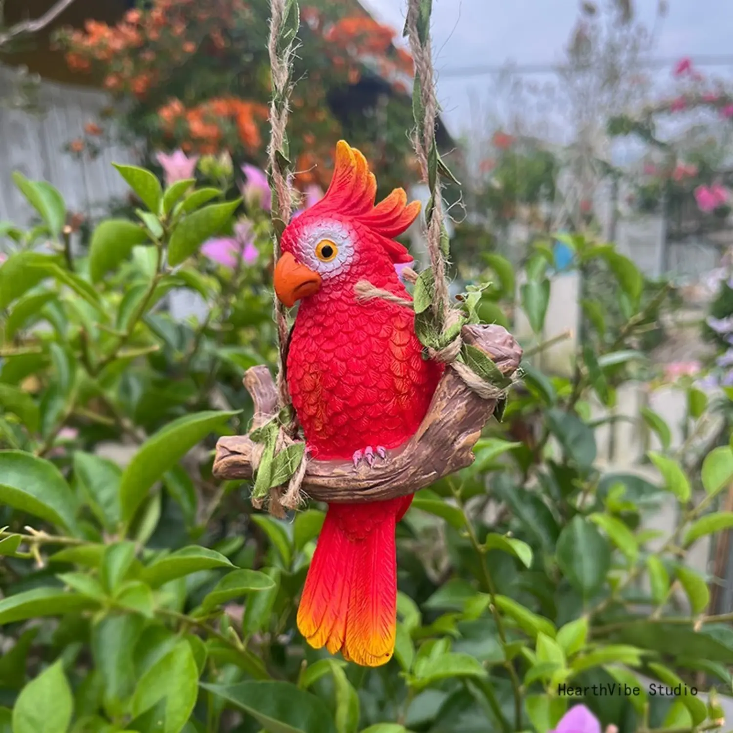 Parrot Hanging Ornament on a Swing, Handmade Resin Figurine, Hangable Outdoor Decoration for Garden, Patio, or Courtyard Wall Art, Home Decorative Ornament, Artificial Hanging, Outside Hanging, Outdoors