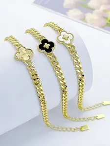 Women's shiny four-leaf clover floral shell 18K gold-plated jewelry bracelet, elegantly designed for daily wear.