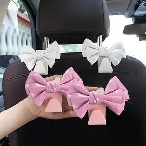 [Stylish Car Seat Hooks] 2pcs Stylish Bow Car Seat Hooks - PU Leather Backseat Storage & Decoration, Fit for All Vehicles, White & Pink Bows for Organized and Chic Interior Accessories, Backseat Hanging Organizer, Car Seat Accessories