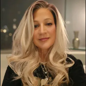 Watered Souls Tricia 20" in icy blonde blend. 13x4 Lace front premium synthetic wig.  High quality fibers, 120 density, Scandinavian hairline, and gorgeous layers.  Heat Tolerance 350. She comes with a free wig cap and free gift.