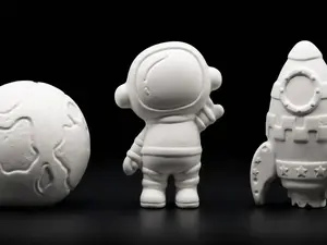 Out Of This World ~ Clay Art Kit astronaut, rocket and Earth shape, 2 Paint Brushes, 6 Paint Pods, and a few Mini surprises.  Perfect for your next homeschool science activity or STEM lessons.