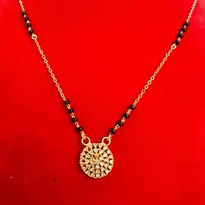 Gold plated daily use Nepali  Mangalsutra with black potey and multiple stone work on it.