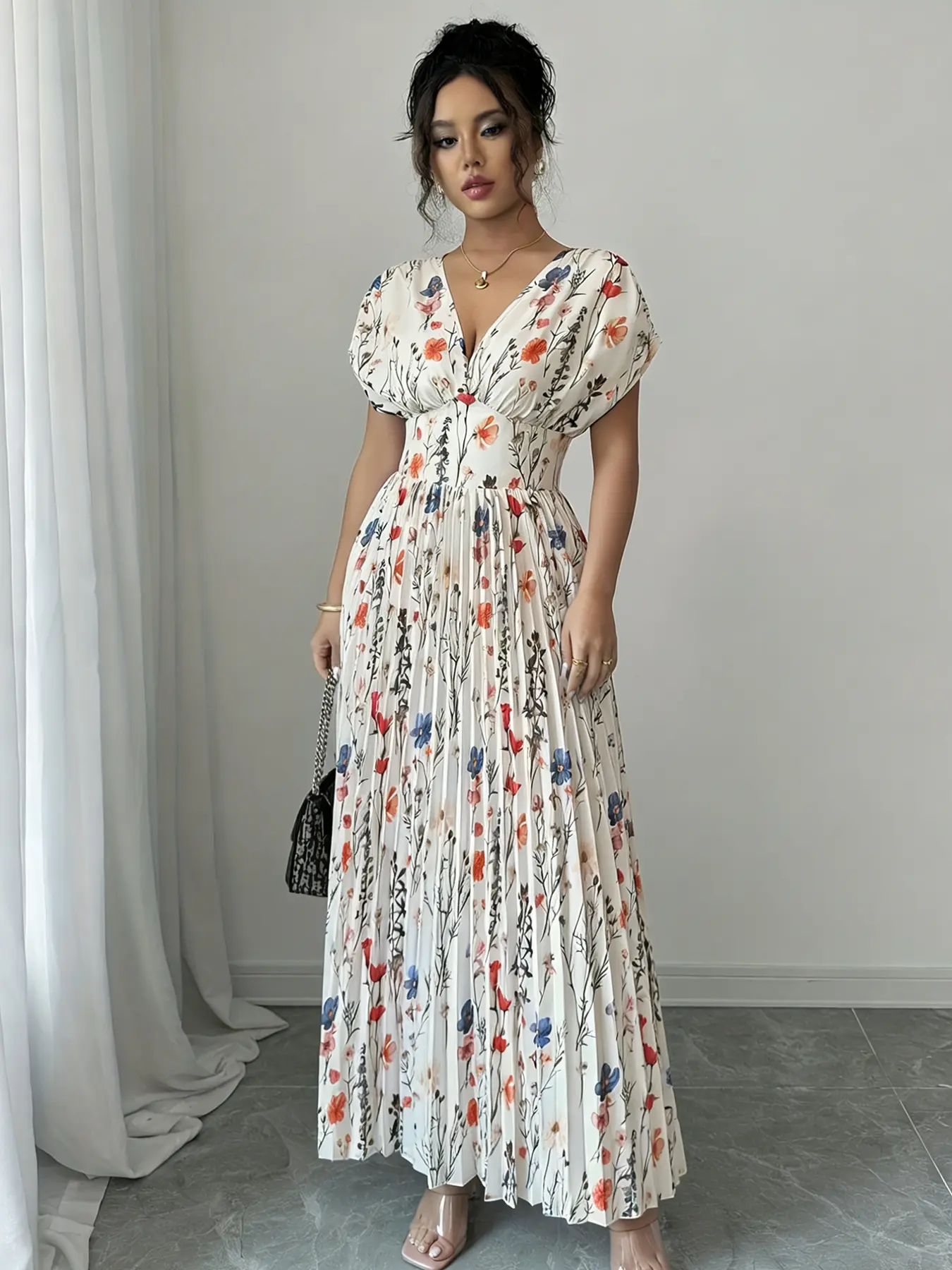 A fashionable white background pleated skirt dress with colorful floral prints for women. The colorful floral prints make it lively, and the pleated skirt is casual and elegant and suitable for Summer commuting to work, shopping, and outdoor wear