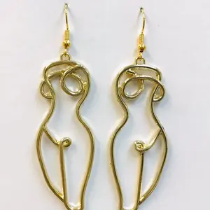Naked woman body earrings