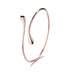 Amy & Annette 18K Water Drop Bangle Bracelet with Smooth Finish and Unique Design