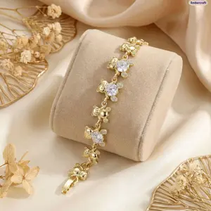 Embercraft Women's 14K Gold Plated Teddy Bear Bracelet with Cute Cubic Zirconia Bear Charm Dainty Adjustable Chain for Girls and Women Minimalist Stackable Wrist Accessory for Daily Wear Party Date Night Birthday Gift