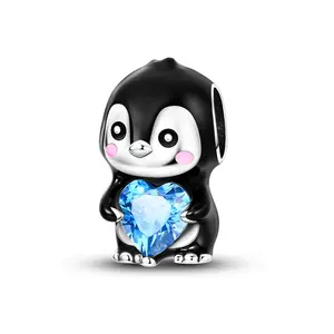 MULA cute penguin holding a heart-shaped pendant, 925 Silver-plated inlaid with blue zircon and enamel - can be used with Pandora bracelets and necklaces, a perfect gift for women, girls, children
