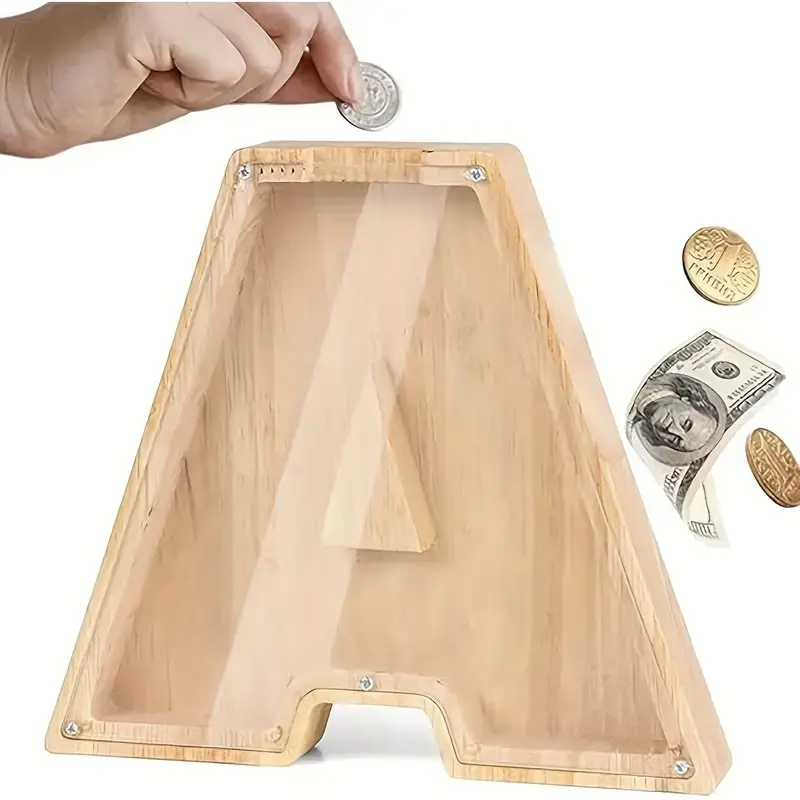 A Unique Wooden Money Bank Featuring The Entire Alphabet from A to Z, Serving As a Storage Jar And Coin Organizer. Its Acrylic Design Makes It a Great Gift for Birthdays, Home Decor, Halloween, Christmas, Thanksgiving, And Easter