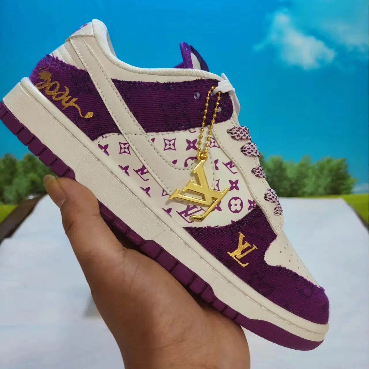 Luxury print trainers with denim-leather mixed upper, timeless white and violet matching accented by fine golden decorative motifs, shock-absorbent rubber sole is a complete game-changer for streetwear fashion lovers
