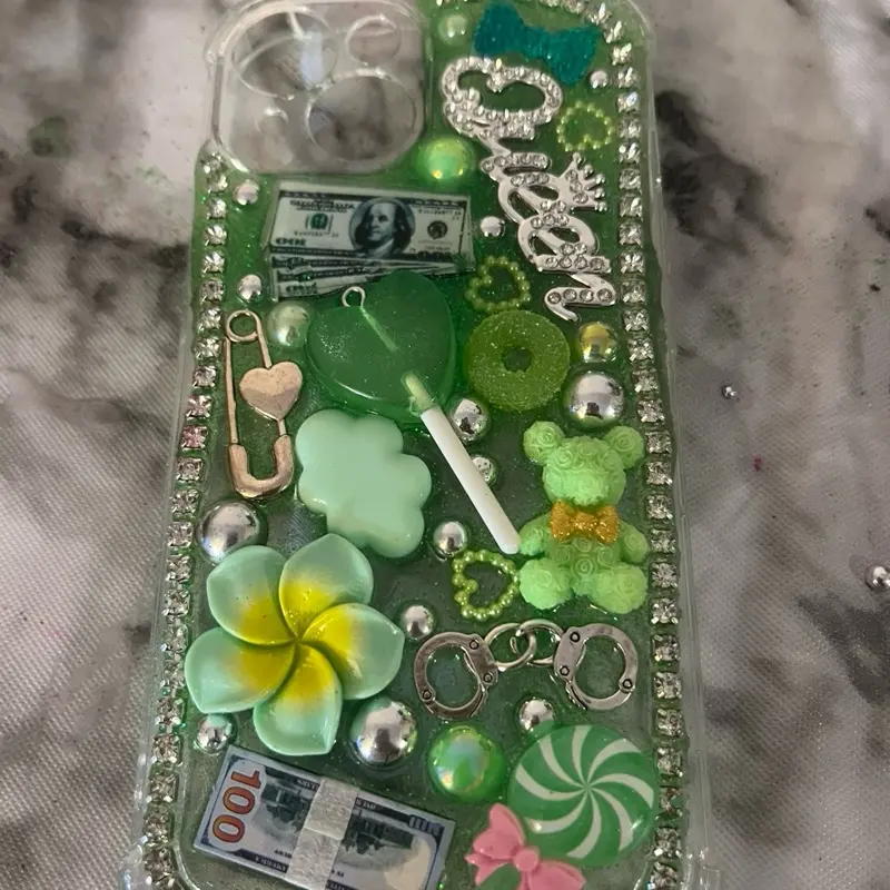 Junk Phone Cases with Colorful Designs and Characters Featuring Hello Kitty and Rainbows