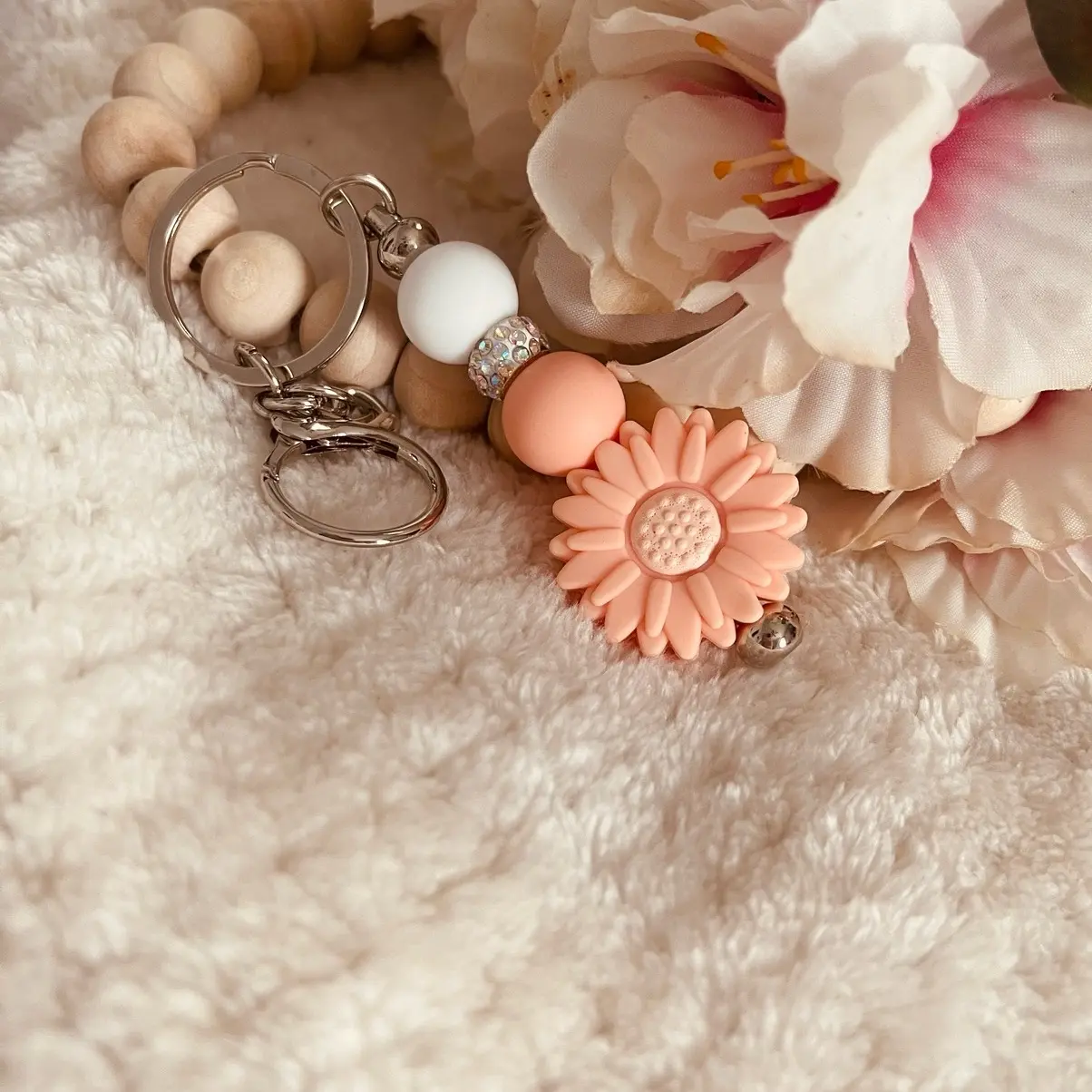 Silicone peach daisy keychain