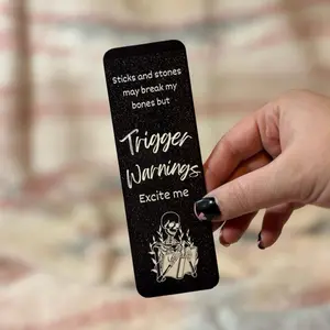 Sticks and Stones Bookmark - Black and White Skull Design with Text "Sticks and Stones May Break My Bones But Trigger Warnings Excite Me"