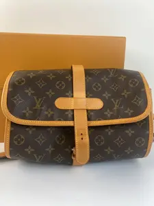 Pre-owned Louis Vuitton Monogram Canvas Roll Up Bag with Leather Trim and Buckle Closure