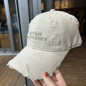 Distressed Baseball Cap with Letter Embroidery — Washed Cotton Soft-Top Sun Hat featuring an Enlarged, Wide Brim for a Face-Slimming Effect