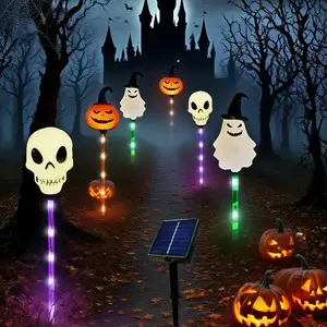 6 solar-powered pumpkin and skull ground plug-in lights for Halloween, with IP44 waterproof rating, creating an eerie atmosphere for garden decorations. Suitable for horror parties, houses, sidewalks, lawns, courtyards and festival decoration activities.