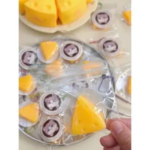Mini Cheese Slice Squishy Keychain - Perfect for Cheese Lovers Mini Cheese Slice Squishy Keychain - Perfect for Cheese Lovers