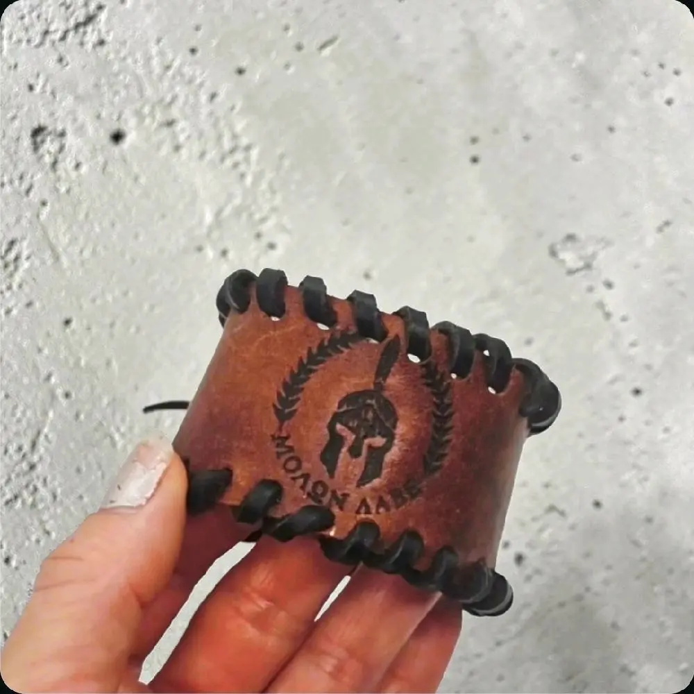 "MΟΛΩΝ ΛΑΒΕ" Handmade Leather Cuff Bracelet with Unique Spartan Design and Braided Edges for Stylish Wear