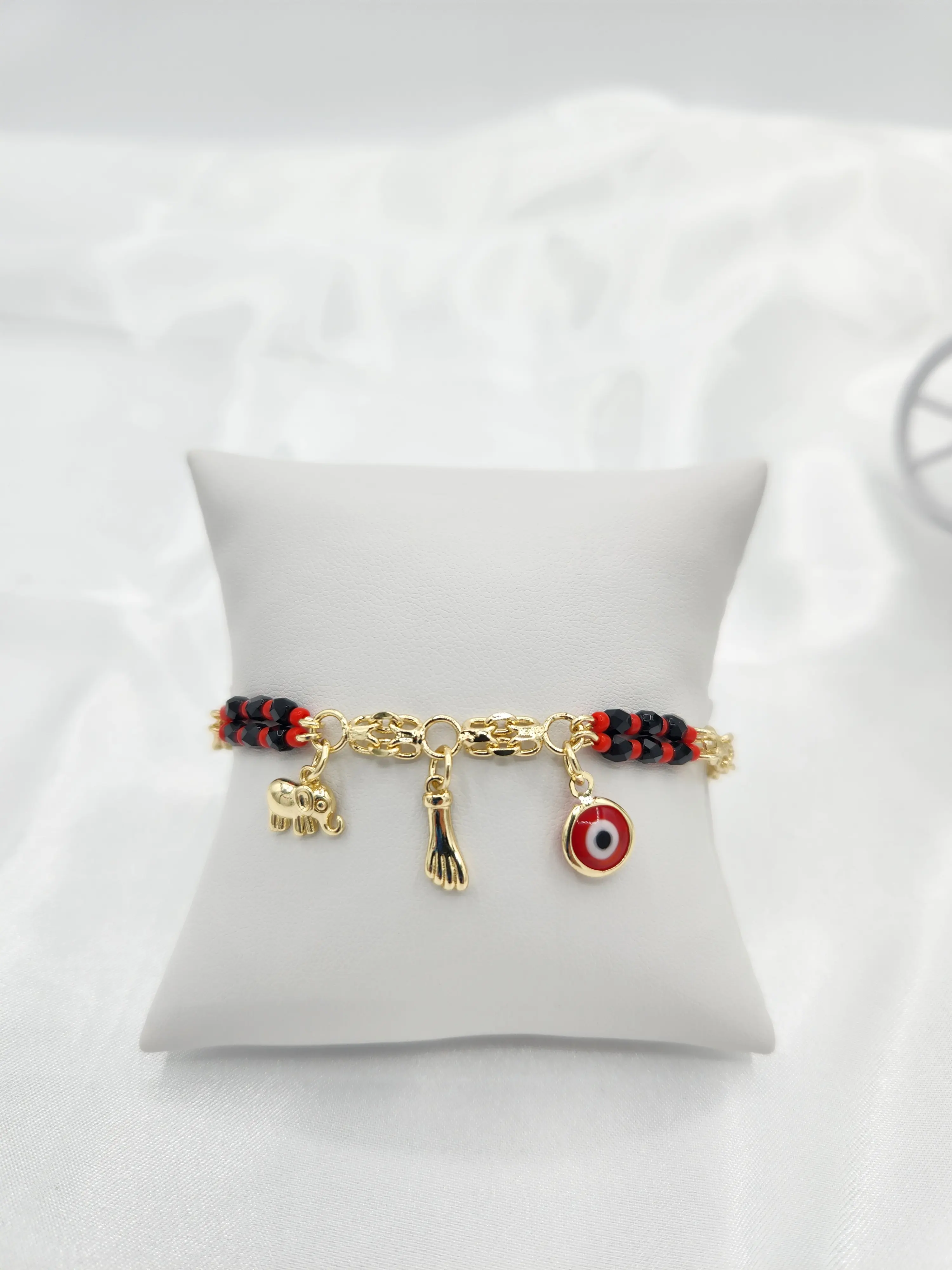 14k gold plated protection charm bracelets.  (41)