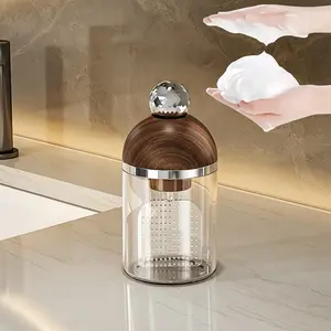 Electric foam maker for Christmas gifts, suitable for facial cleansers, shampoos, and shower gels. Rechargeable, produces rich foam for deep skin cleansing. Bathroom accessory.