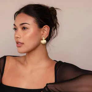 Golden-colored, large and small shell earrings