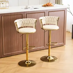 Gold Swivel Velvet Bar Stools with Cream Cushions & Gold Accents for Modern Kitchen Design